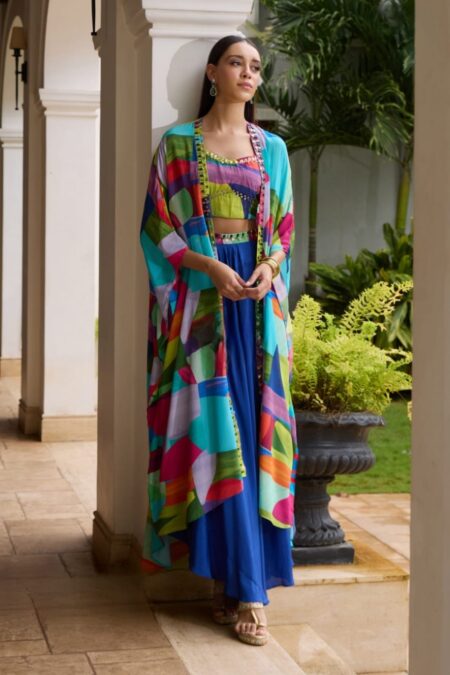 Navy blue skirt with a multicolured long cape