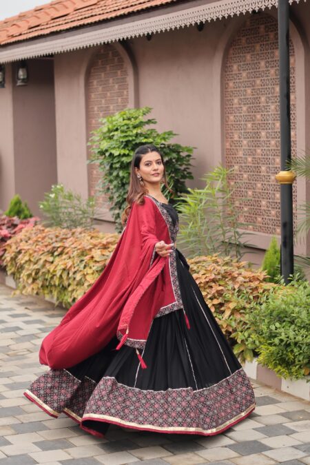 Ajrakh and gamthi work with mirror lace work Navratri lehenga choli with dupatta